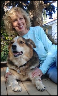 Woman smiling with dog